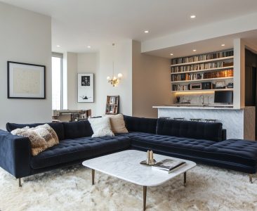 Modern Living Room Design with Dark Blue L-Shaped Sofa and Marble Table-img