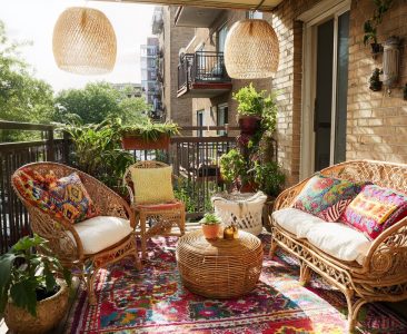 bohemian-balcony-design-with-wicker-furniture-and-cane-lighting-img