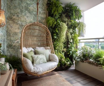 tropical-balcony-design-with-vertical-garden-and-hanging-chair-img
